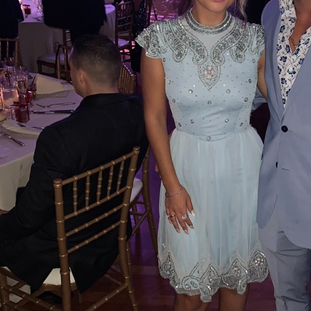 Frock And Frill high neck mini dress with allover embellishment in soft blue.